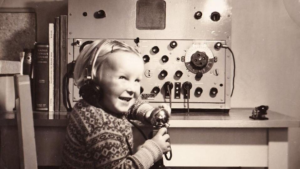 Child using phone at Awarua Communications Museum